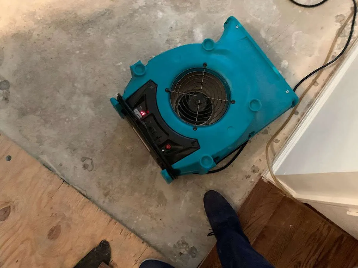 Air mover drying subfloor during Leak Detection & Repair in Westlake Village